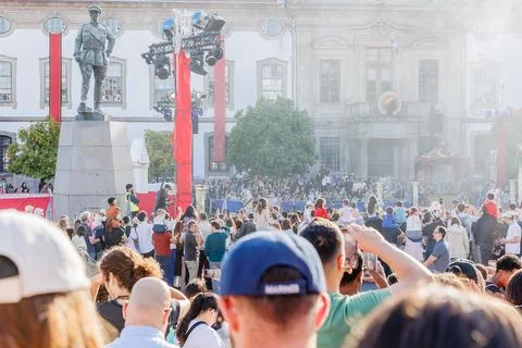 Crowd of spectators watching a show in front of the town hall of Braga, Por.. Stock Photos