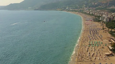 Crowd spending time at cleopatra beach aerial Stock Footage 41336899