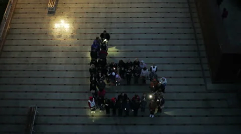Crowd standing in the form of letters Stock Footage 61261123