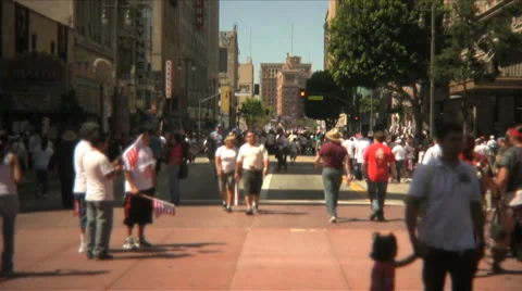 Crowd on streets of L.A. Slow motion - Immigration march Stock Footage 907484