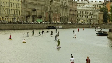 Crowd Surfing Down the River. Surfer Costume Celebration Event. Saint Petersburg Video stock 79206559