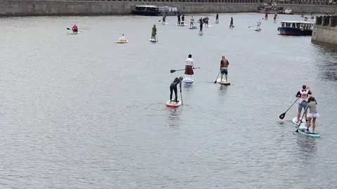 Crowd Surfing Down the River. Surfer Costume Celebration Event. Saint Petersburg Stock Footage 79206725