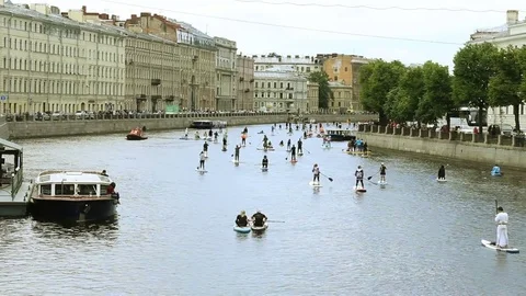 Crowd Surfing Down the River. Surfer Costume Celebration Event. Saint Petersburg Stock Footage 79206918