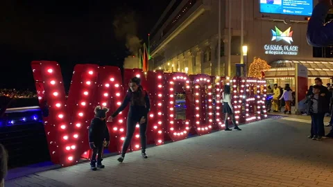 Crowd Time-lapse with Light-Up Sign for Destination Vancouver Tourism Stock Footage 275855579
