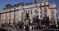 Crowd of Tourists People Walk on Sidewalk Visit Piccadilly Circus London Center 4k or 4k+ Resolution