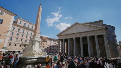 Crowd of tourists on a sunny day in front of the facade of the famous Pantheon Stock Footage 308412487