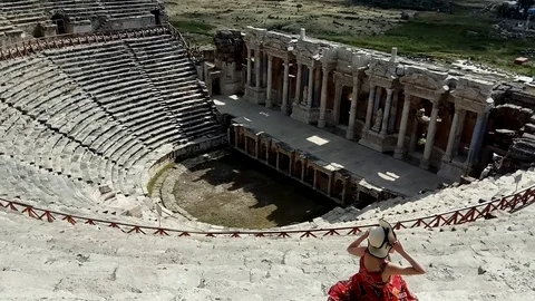 Crowd of tourists walking in Ancient ruins. Pammukale. Stock Footage 108999837