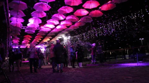 Crowd Under Glowing Umbrellas Stock Footage 47031650