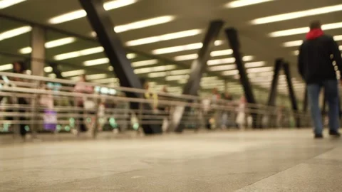 Crowd of unrecognizable pedestrians walks through the underpass. Low angle view Stock Footage 281412383