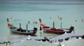 A crowd of vacationers enjoy the warm beach during the summer, travel, vacation HD Footage