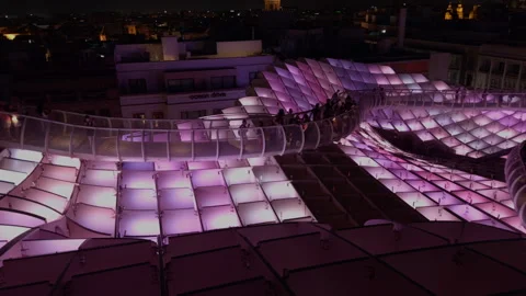 Crowd Of Visitors On The Curving Setas De Sevilla Walkway At Night Vídeos de archivo 348741934