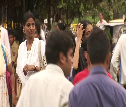 Crowd waiting at traffic light, then crossing busy street Stock Footage 86742359