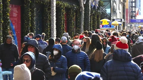 Crowd  Walk Down Fifth Avenue On Last Sunday Before Christmas 2021 NYC Video stock 168581071