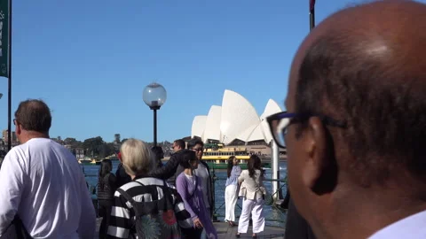 Crowd Walking In Front Of Sydney Opera House Stock Footage 254263036