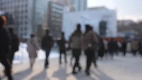 Crowd walking to large snow sculpture at winter Sapporo Snow Festival Stock-Footage 328715923
