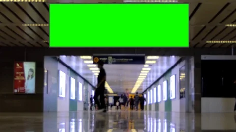 Crowd walking pass blank advertising billboard green screen. Stock Footage 78111183