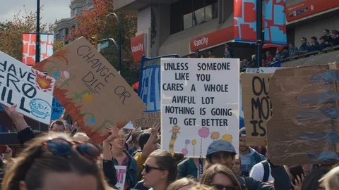 Crowd walking with protest signs for climate action. Vancouver, Sept 2019. Video stock 117964793