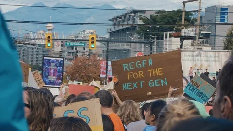 Crowd walking with protest signs for climate action. Vancouver, Sept 2019. Video stock 117965080