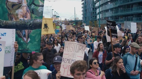 Crowd walking with protest signs for climate action. Vancouver, Sept 2019. Video stock 117969970