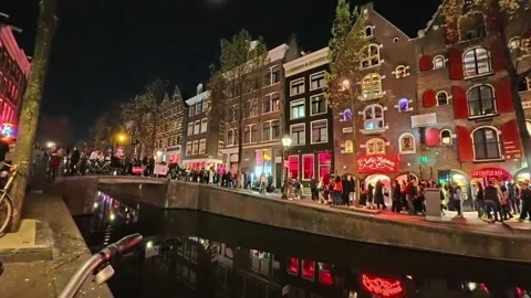 Crowd Walking on Red Light District Street at Night, Amsterdam, Netherlands. 4K Stock Footage 307941587