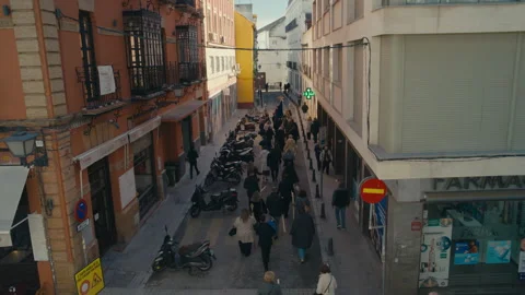 Crowd Walking In Religious Procession Through Seville Street Stock Footage 333684741
