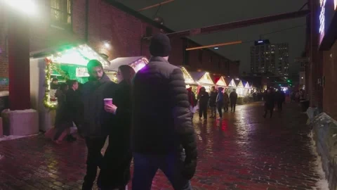 Crowd walking through Distillery District Christmas Market at night, Toronto Stock-Footage 325095403