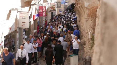Crowd Walking Through Jerusalem Stock Footage 69896984