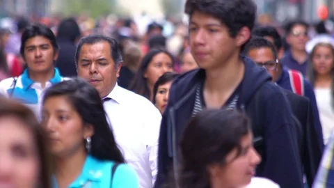 Crowd walking through street. TAKE5-SLOW MOTION Stock Footage 90961787