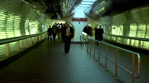 Crowd walking toward camera at train station in tunnel commuters Stock Footage 45866693