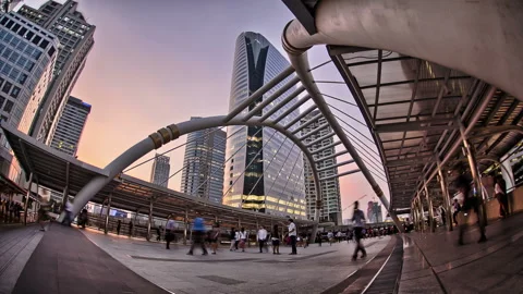 Crowd Walking under Colorful Sunset in Chong Nonsi Bts Sathorn Area in Bangko Stock Footage 233729991