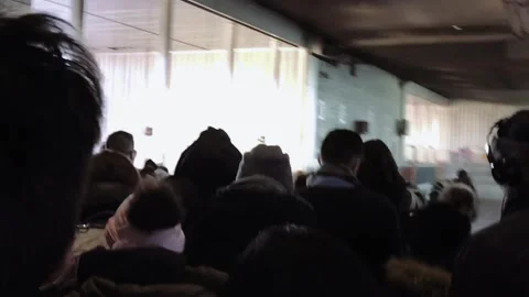 Crowd walking without space with claustrophobic atmosphere and tight camera Stock Footage 136204418