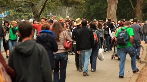 Crowd Walks in Park Stock Footage 884028