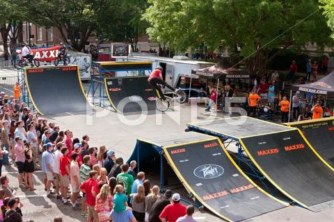 Crowd Watches BMX Pro Perform Ramp Tricks In Athens Competition Stock Photos