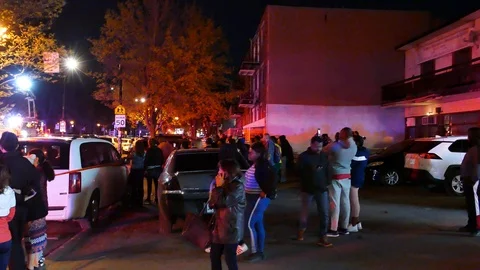 Crowd watching emergency service Stock Footage 114946464