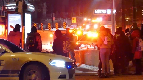 Crowd watching EMS progressing CPR on victim Stock Footage 125472064