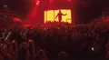 Crowd watching, filming great video background on big stage display at concert 4k or 4k+ Resolution