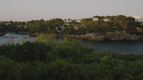 Crowd watching a glowing eclipse at dusk over a Mediterranean town (clip 3) Stock Footage 343431235