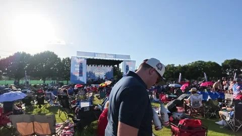 Crowd watching live band performance on outdoor stage Stock Footage 340941143