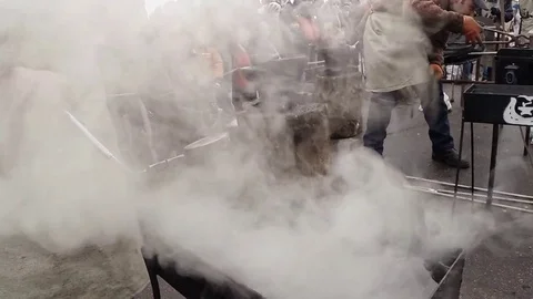 Crowd is Watching Over Work Blacksmiths in Square in Honor of a Holiday Stock Footage 74792233