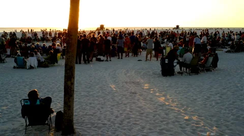 Crowd Watching Sunset at Beach - Time Lapse Stock Footage 999670