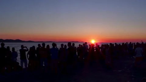 Crowd watching sunset Stock Footage 157648793