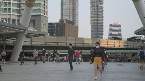 The crowd is wearing protective masks prevent Coronavirus, Covid 19 virus dur Stock Footage 126750231