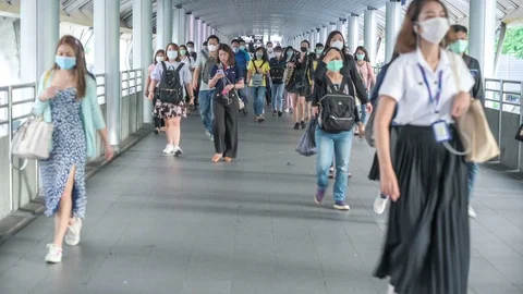 The crowd is wearing protective masks prevent Coronavirus, Covid 19 virus dur Stock Footage 126750232