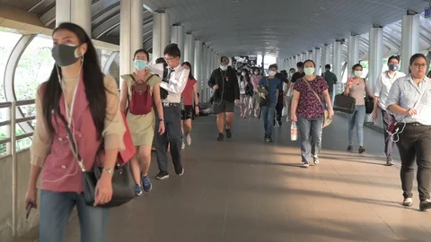 The crowd is wearing protective masks prevent Coronavirus, Covid 19 virus dur Stock Footage 126750254