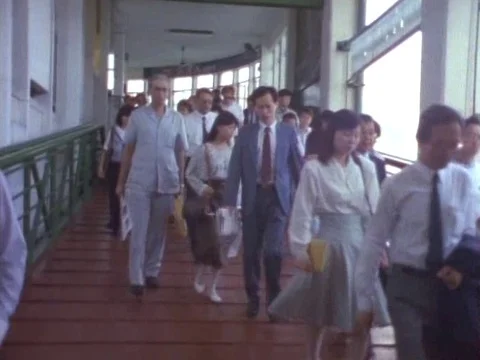 Crowd of well dressed people embarking on the ferry Stock Footage 79878256
