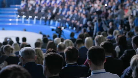 Crowd work at official trading forum of collaboration or economic idea. Informat Stock Footage 199475371