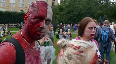 Crowd of zombies preparing to go for a zombie walk in the streets of the city Stock Footage 68703020