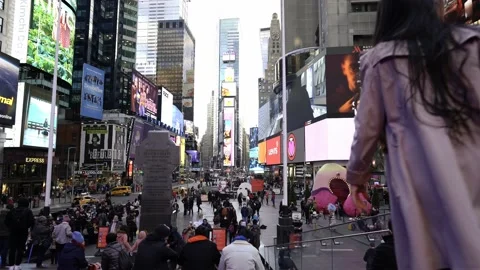 Crowded and busy Times Square in NYC. Tourists visiting famous landmark Stock Footage 200310327