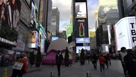 Crowded and busy Times Square in NYC. Tourists visiting famous landmark Stock Footage 200312498