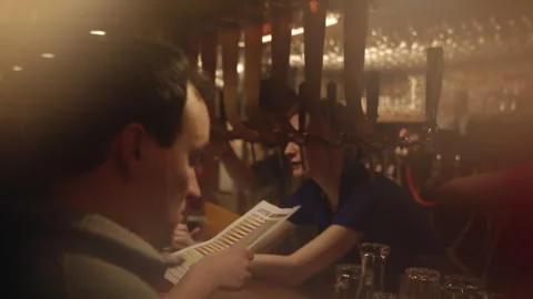 Crowded Bar With Workers Serving Behind Beer Taps Stock-Footage 344029801